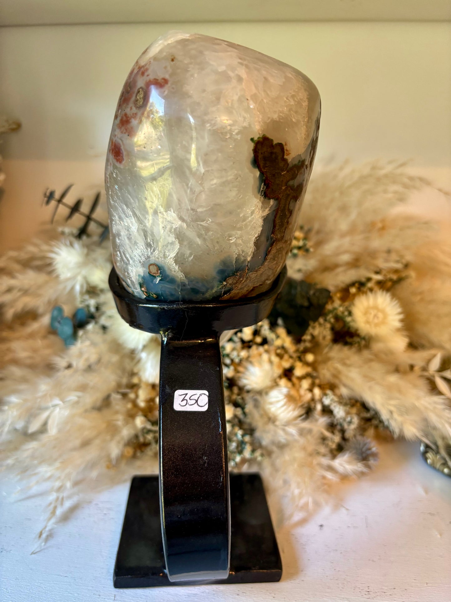 Sugary pink rainbow amethyst on custom stand from Uruguay, fully polished